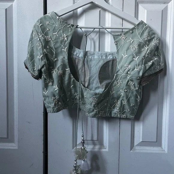 Turquoise Net Embroidered Lehenga Choli - Picture 4 of 9